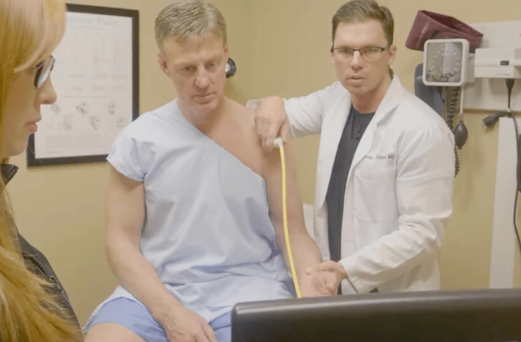 Regenexx doctor examining a patient during a second opinion consult.